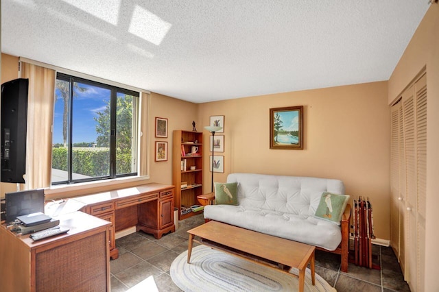 living room with a textured ceiling