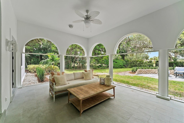 view of patio / terrace with an outdoor living space and ceiling fan