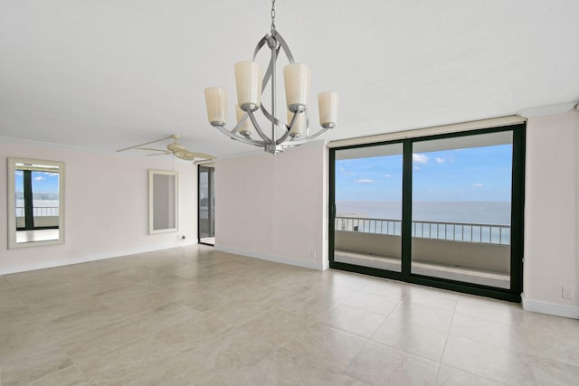 spare room with ceiling fan with notable chandelier, crown molding, a wall of windows, and baseboards