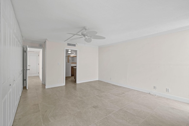 unfurnished bedroom with ceiling fan, visible vents, baseboards, and ornamental molding