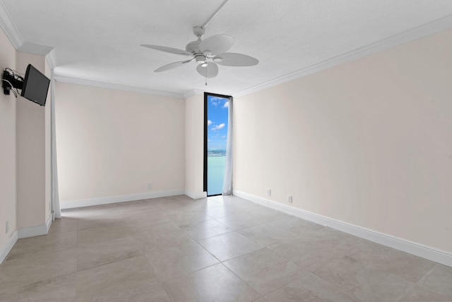 empty room featuring a textured ceiling, ceiling fan, and ornamental molding