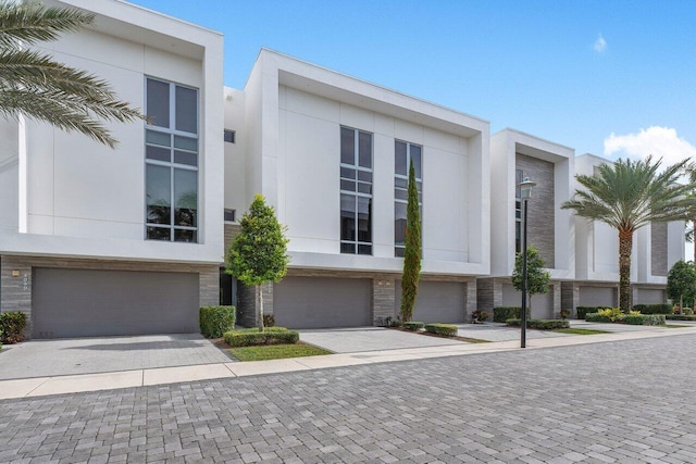 modern home featuring a garage