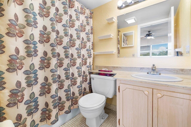 bathroom featuring tile patterned floors, vanity, ceiling fan, toilet, and curtained shower