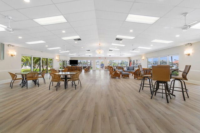 dining area featuring ceiling fan and light hardwood / wood-style flooring