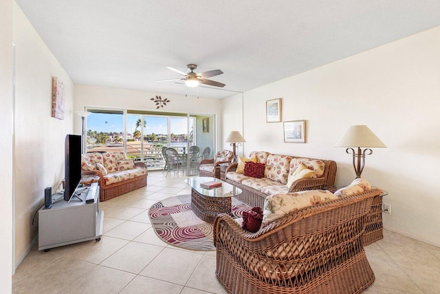 tiled living room with ceiling fan and a textured ceiling