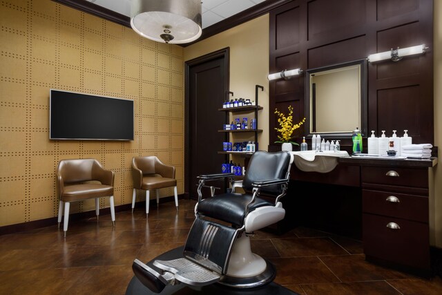 interior space featuring vanity, crown molding, and tile patterned floors