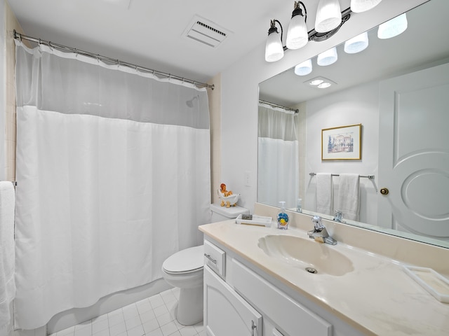 bathroom with tile patterned flooring, a shower with curtain, vanity, and toilet