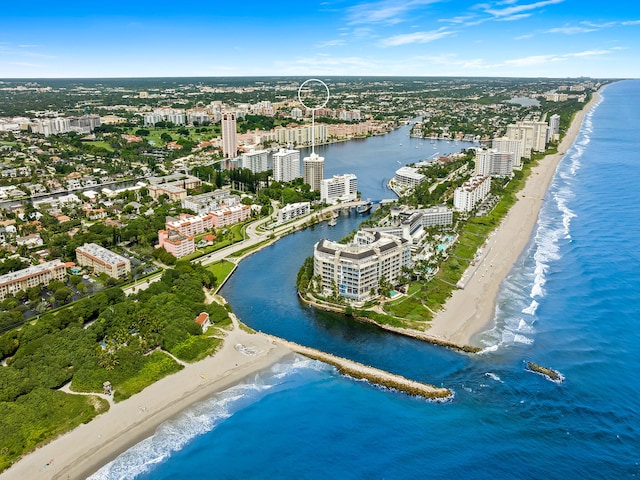 aerial view with a water view and a view of the beach