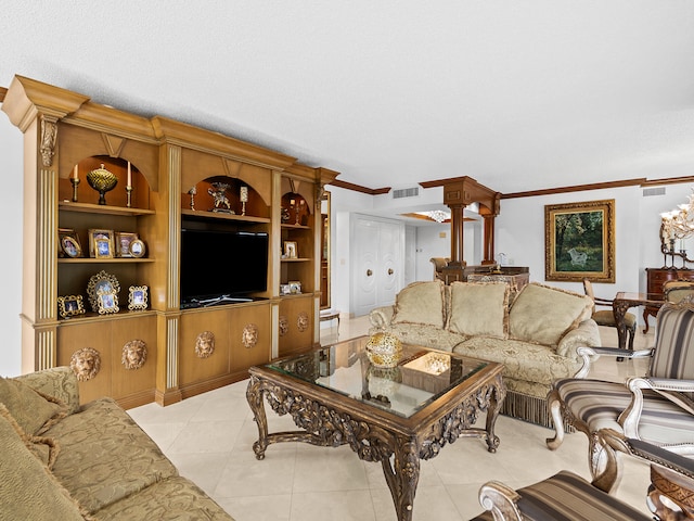 living room with a chandelier, decorative columns, ornamental molding, light tile patterned floors, and a textured ceiling