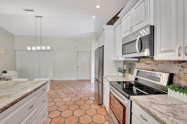 kitchen with backsplash, an inviting chandelier, decorative light fixtures, white cabinetry, and stainless steel appliances