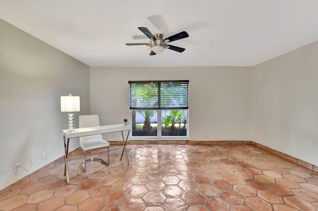 office space featuring ceiling fan