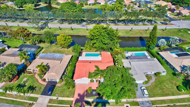 drone / aerial view with a water view