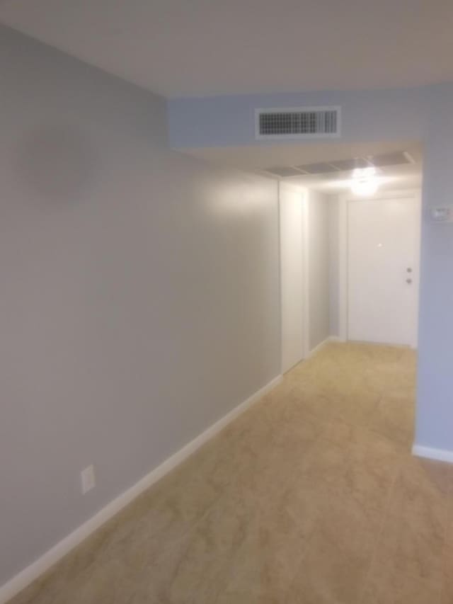 405 US Highway 1 Unit 307, Palm Beach Gardens, FL 33408 - spare room with light carpet and baseboards