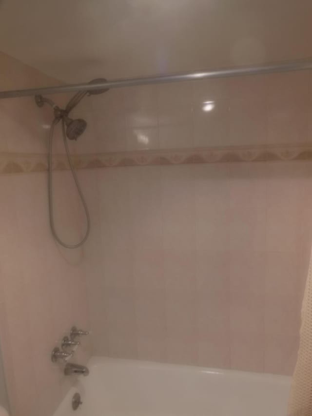 405 US Highway 1 Unit 307, Palm Beach Gardens, FL 33408 - full bathroom featuring shower / bathtub combination with curtain