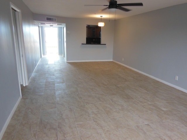 unfurnished living room featuring ceiling fan