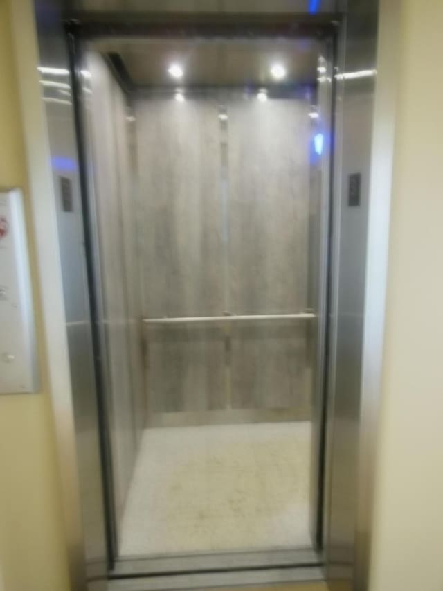 bathroom featuring elevator