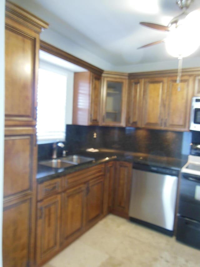 405 US Highway 1 Unit 307, Palm Beach Gardens, FL 33408 - kitchen featuring dishwasher, a sink, brown cabinetry, and white microwave