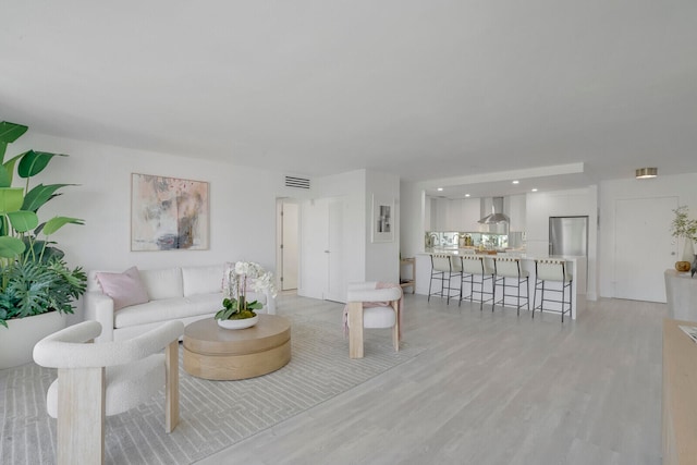 living room with light wood-type flooring