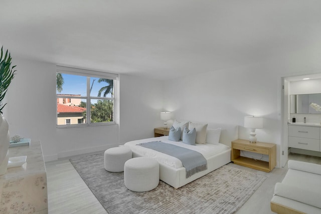 bedroom featuring light hardwood / wood-style flooring