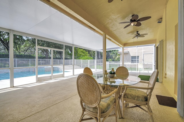 sunroom / solarium with ceiling fan