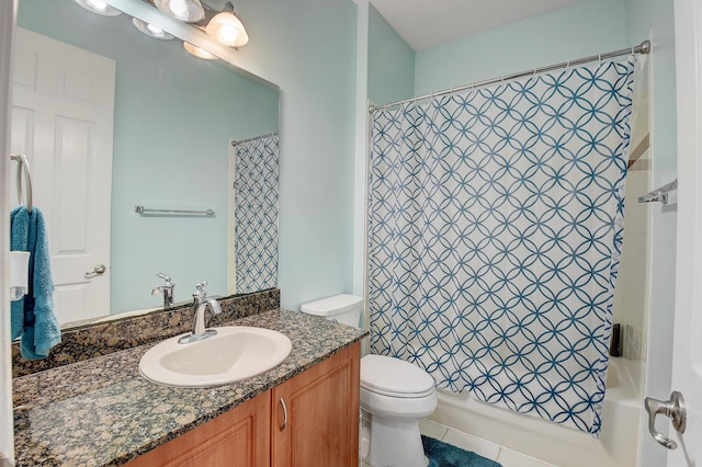 full bathroom with toilet, vanity, and shower / tub combo with curtain