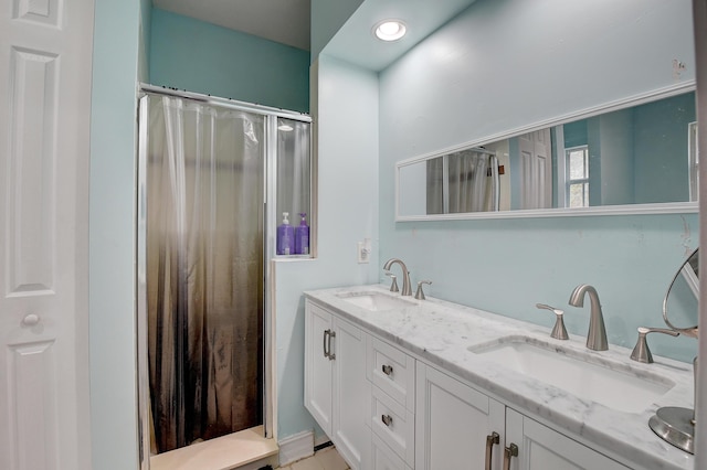 bathroom featuring a shower with curtain and vanity