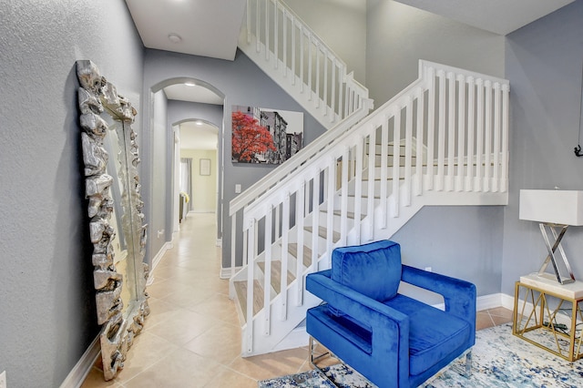 foyer with light tile patterned floors