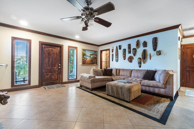 tiled living room with ornamental molding and ceiling fan