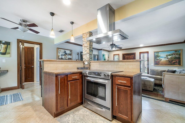 kitchen with ceiling fan, stainless steel range with electric stovetop, pendant lighting, and island range hood