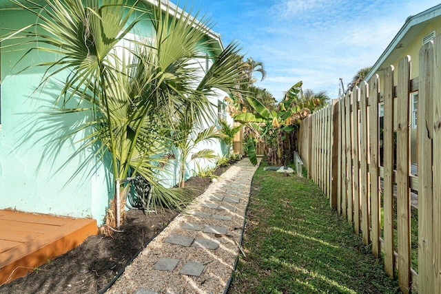 view of yard with a fenced backyard