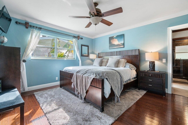 bedroom with ceiling fan, dark wood-type flooring, and crown molding