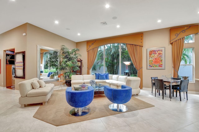 living room with light tile patterned flooring