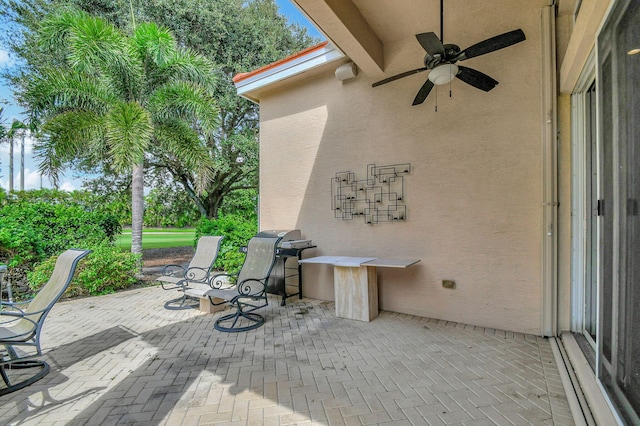 view of patio with ceiling fan