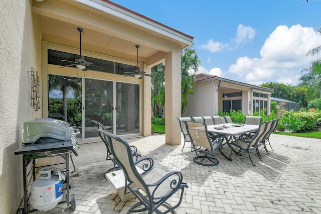 view of patio / terrace featuring ceiling fan