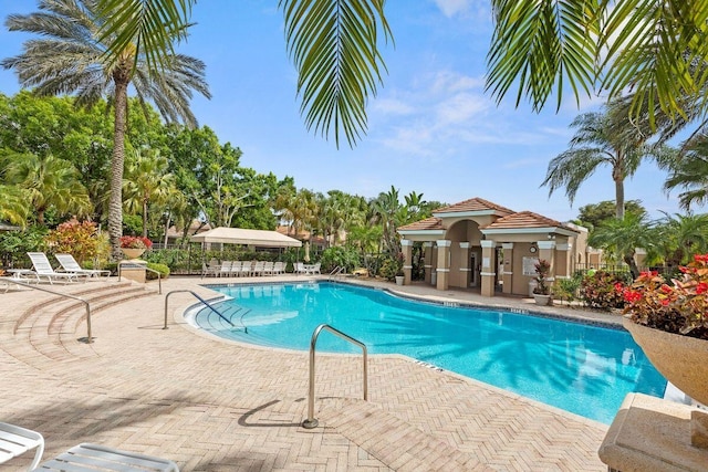 view of swimming pool featuring a patio