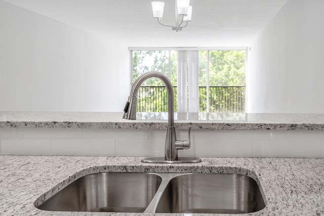 details with light stone counters and sink