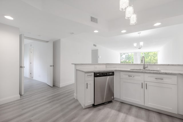 kitchen with light wood-type flooring, sink, white cabinetry, light stone countertops, and stainless steel dishwasher