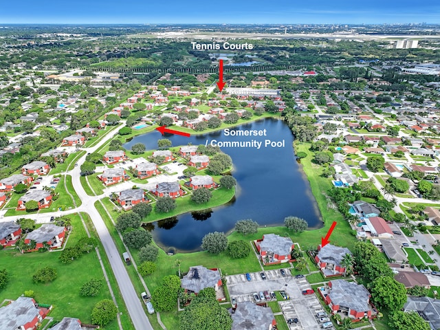 birds eye view of property featuring a water view