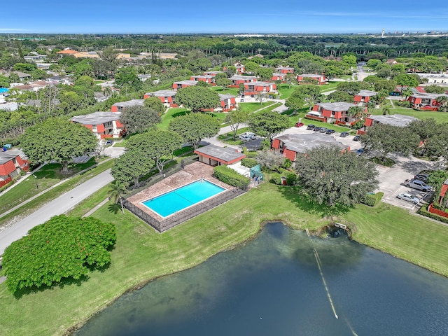 drone / aerial view with a water view