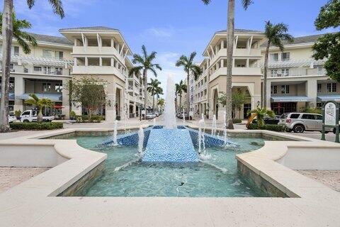 view of pool with pool water feature