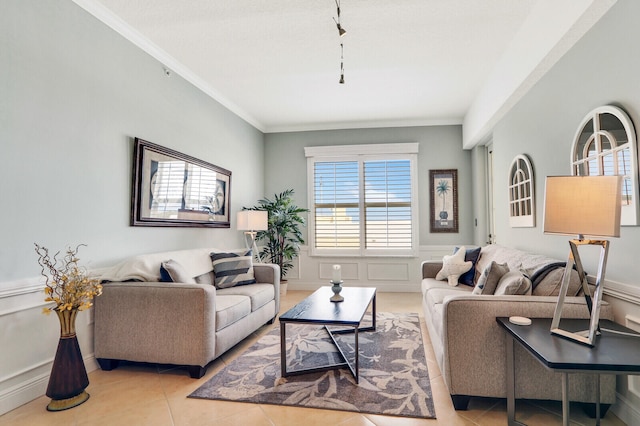 living room featuring crown molding and light tile patterned floors