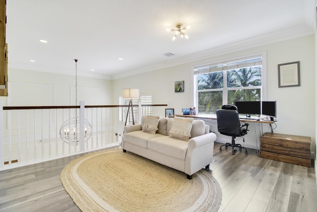 home office featuring crown molding, a chandelier, and light wood-type flooring