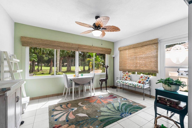 sunroom / solarium with ceiling fan