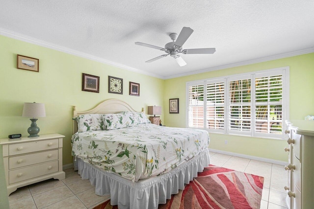 bedroom featuring ceiling fan, light tile patterned flooring, and ornamental molding