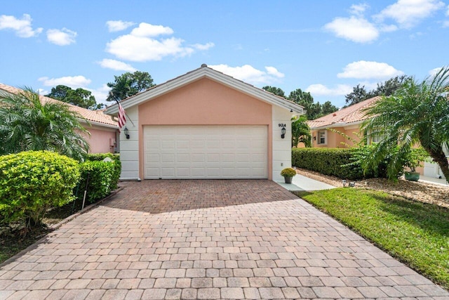 view of front of home with a garage