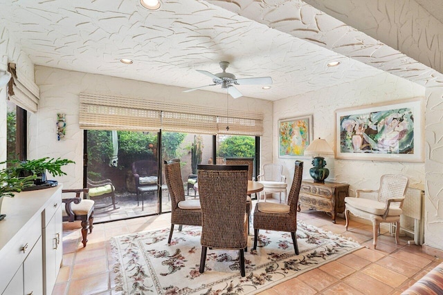 sunroom / solarium with ceiling fan