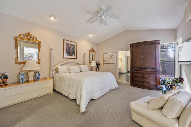 bedroom featuring ceiling fan, carpet floors, and lofted ceiling