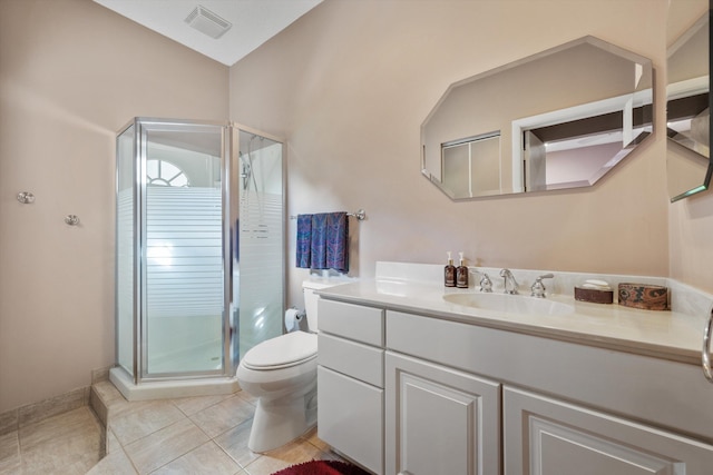 bathroom featuring lofted ceiling, vanity, tile patterned flooring, an enclosed shower, and toilet