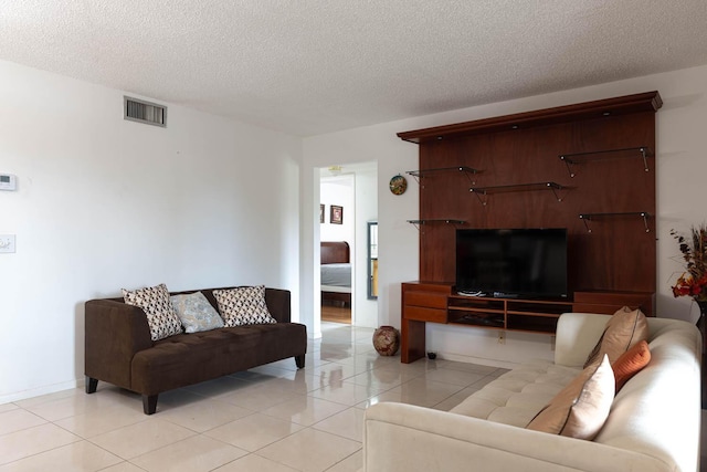 337 Knotty Pine Cir Unit D2, Greenacres, FL 33463 - living room featuring visible vents, a textured ceiling, and light tile patterned floors