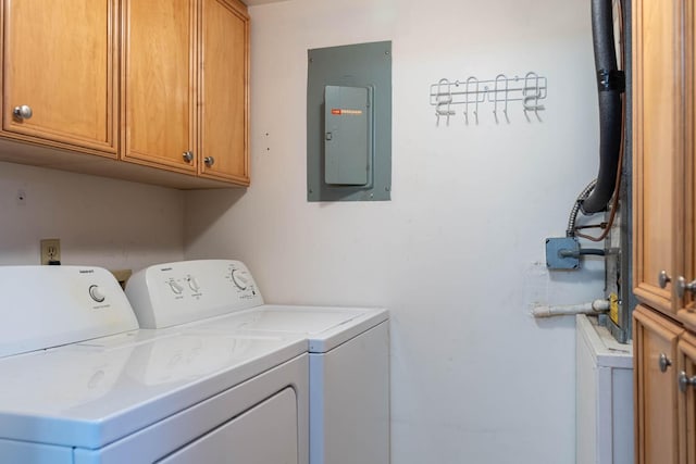 337 Knotty Pine Cir Unit D2, Greenacres, FL 33463 - clothes washing area with washing machine and clothes dryer, cabinet space, and electric panel